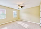 Thumbnail 10 of 23 - large bedroom with two windows and ceiling fan an light