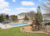 Thumbnail 9 of 14 - Burnsville, MN Townhomes – Summit Townhomes - resort style pool and playground