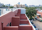Thumbnail 56 of 78 - a view of the city from the roof of a building