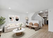 Thumbnail 66 of 78 - Cozy living area with a beige sofa, chic armchairs, a round marble coffee table, and modern wall art creating a welcoming ambiance.