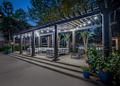 Thumbnail 22 of 39 - Apartments In Houston Texas for Rent – Westchase Forest - Photo of lounge area near swimming pool