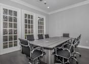 Thumbnail 29 of 39 - a room filled with rows of chairs in front of windows