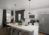 Thumbnail 19 of 31 - a kitchen with stainless steel appliances and a white counter top