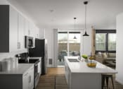 Thumbnail 21 of 31 - Roseville, CA Single Family Rental Homes - Vera at Fiddyment - Kitchen with Wood-Style Plank Flooring, Quartz Countertops, Stainless-Steel Appliances, Pendant Lights, and Kitchen Island with Double Basin Undermount Sink.