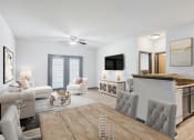 Thumbnail 7 of 18 - Parc at Metro Center Apartments in Nashville, TN photo of a living room and dining room with a table and chairs