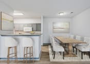 Thumbnail 6 of 18 - Nashville, TN Apartments - Parc at Metro Center - Kitchen with gray cabinets and dining room