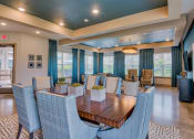 Thumbnail 30 of 33 - The Clubhouse with a table and seats at Parc at Bentonville