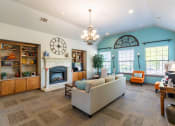 Thumbnail 21 of 25 - Club house with ceiling light and couches and windows