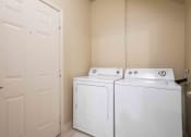 Thumbnail 10 of 25 - a washer and dryer are available in the laundry room