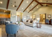 Thumbnail 16 of 25 - clubhouse with chairs and couches and ceiling light