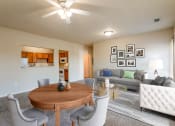 Thumbnail 7 of 25 - Clarksville, TN Apartments - Parc at Clarksville - living and dining room area with ceiling fan