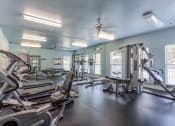 Thumbnail 18 of 25 - Apartments in Clarksville, TN for Rent - Parc at Clarksville - Fitness Center with strength training machines
