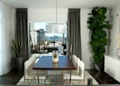 Thumbnail 11 of 29 - A dining room with a table and chairs.