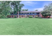 Thumbnail 18 of 20 - The Jaunt Apartments in Charleston South Carolina photo of exterior community building with grassy area