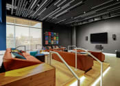Thumbnail 27 of 43 - a large room with wooden furniture and a large window