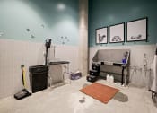 Thumbnail 35 of 43 - a bathroom with a shower and a sink and a piano