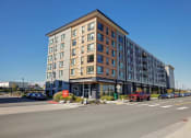 Thumbnail 40 of 43 - a new apartment building on the corner of a city street