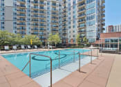 Thumbnail 12 of 38 - pool with building exterior