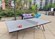 Thumbnail 20 of 38 - outdoor ping pong table and courtyard