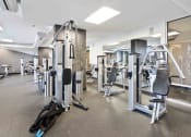Thumbnail 16 of 38 - fitness center with strength training equipment