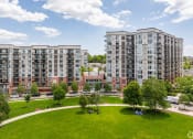 Thumbnail 30 of 38 - an aerial view of a park with apartment buildings