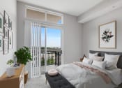 Thumbnail 4 of 38 - bedroom with large balcony window