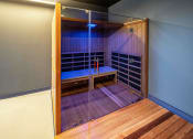 Thumbnail 16 of 31 - 3thirty3 new rochelle ny apartment high rise photo of infrared sauna with teak wood and glass doors next to fitness center