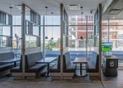 Thumbnail 24 of 31 - 3thirty3 new rochelle ny apartment high rise photo of co-working area with multiple booths and tables for working and conferences
