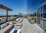 Thumbnail 25 of 31 - 3thirty3 new rochelle ny apartment high rise photo of outdoor terrace with multiple seating areas