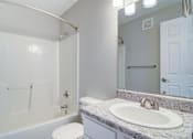 Thumbnail 14 of 19 - Rutland Place apartments in Macon, Georgia photo of bathroom