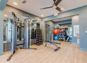 Thumbnail 3 of 22 - Wellness and fitness center with cardio and strength training equipment at Sage 5430 apartments near Historic Downtown Norcross.