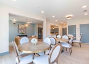 Thumbnail 3 of 18 - Senior living dining room in Norcross with comfortable seating and a welcoming atmosphere.