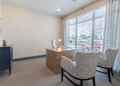 Thumbnail 20 of 22 - Leasing office with welcoming seating area at Sage 5430 apartment community in Norcross, Georgia.