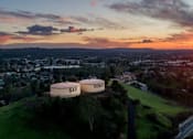 Thumbnail 21 of 21 - Sunnyside Senior Apartments in San Dimas California photo of water wells overlooking the city