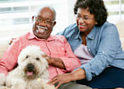 Thumbnail 10 of 18 - Happy senior couple with pet dog at Sage 5430 pet-friendly apartments in Norcross