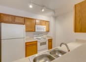 Thumbnail 15 of 44 - Kitchen with Double Sink at Valley Springs Apartments