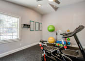 Thumbnail 14 of 19 - the gym at the whispering winds apartments in pearland, tx