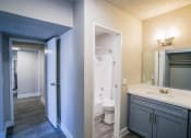 Thumbnail 29 of 31 - a bathroom with a sink toilet and shower