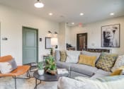 Thumbnail 2 of 19 - Sky Harbor Apartments in Chamblee, GA photo of a seating area in clubhouse