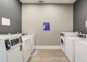 Thumbnail 7 of 19 - Sky Harbor Apartments in Chamblee, GA photo of a laundry facility