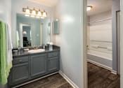 Thumbnail 8 of 14 - Bathroom with vanity and updated finishes in Stockbridge GA apartment at Southwinds Point