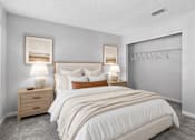 Thumbnail 9 of 18 - Comfortable bedroom with neutral finishes at Southwinds Point Apartments offering pet-friendly one, two and three bedroom apartment homes in Stockbridge, GA.