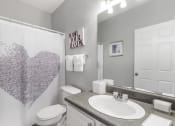 Thumbnail 6 of 16 - St. Ives Crossing apartments in Stockbridge Georgia photo of bathroom with lots of light