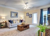 Thumbnail 5 of 27 - Villas at Hannover Apartments in Stockbridge, GA photo of living room with plush carpeting