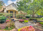 Thumbnail 19 of 19 - A house with a garden in front.