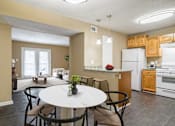Thumbnail 11 of 29 - Dining room at Stratford Ridge Apartments near Smyrna, GA, featuring ample space for meals and gatherings with natural lighting and modern fixtures.