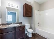 Thumbnail 10 of 20 - Sugar Mill Apartments in Addis, LA photo of a bathroom with a sink toilet and a bath tub