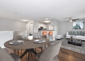 Thumbnail 6 of 14 - Townhomes In Burnsville, MN for Rent – Summit Townhomes - dining room area with view of living room and kitchen
