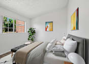 Thumbnail 7 of 21 - Bedroom with large window at Sunnyside Senior Apartments pet-friendly homes