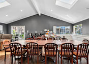 Thumbnail 19 of 21 - Comfortable community room for social gatherings and activities at Sunnyside Senior Apartments in San Dimas, CA